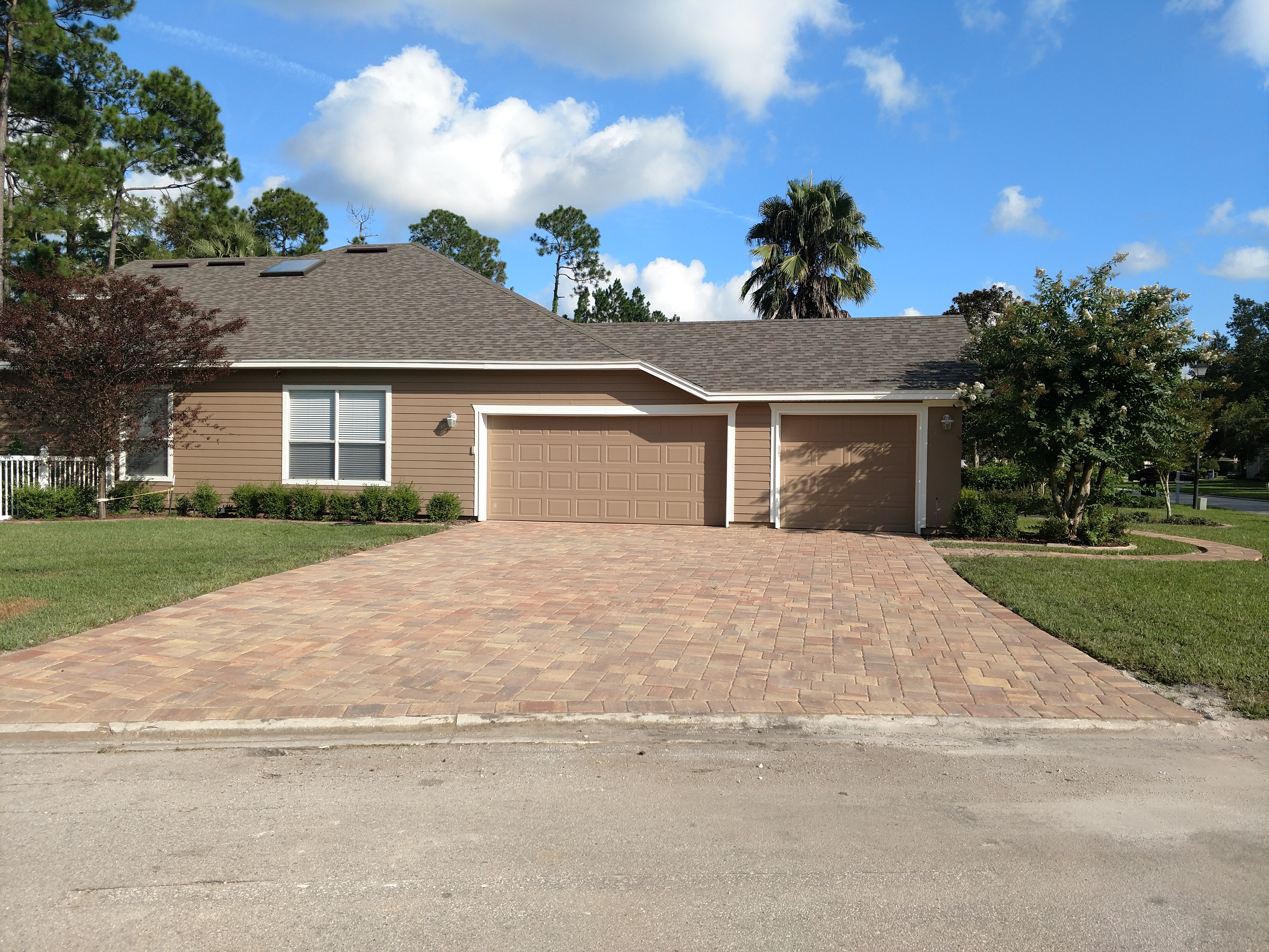 After — light tone paver driveway St Johns